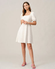 The Solid Textured Puff Sleeve Mini Dress